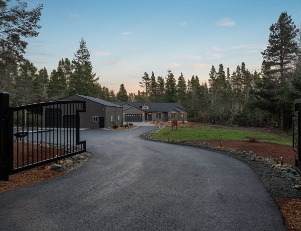 Gated entrance and private driveway leading to Trail House on 2 wooded acres